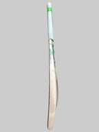 Wooden cricket bat on a hexagonal tiled floor