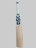 Cricket bat with DSC branding on a tiled floor