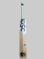 Cricket bat with DSC branding on a tiled floor