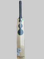Cricket bat on a hexagonal patterned floor