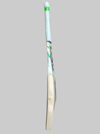 White cricket bat with green accents on a hexagonal tiled floor