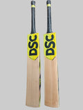 Two cricket bats with DSC branding on a tiled floor.
